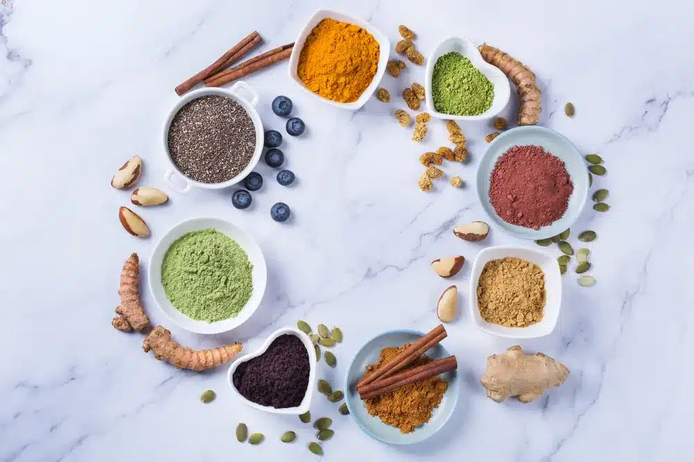 A variety of plant-based foods including grains, legumes, vegetables, and vegan substitutes for a smooth transition to a vegan lifestyle.