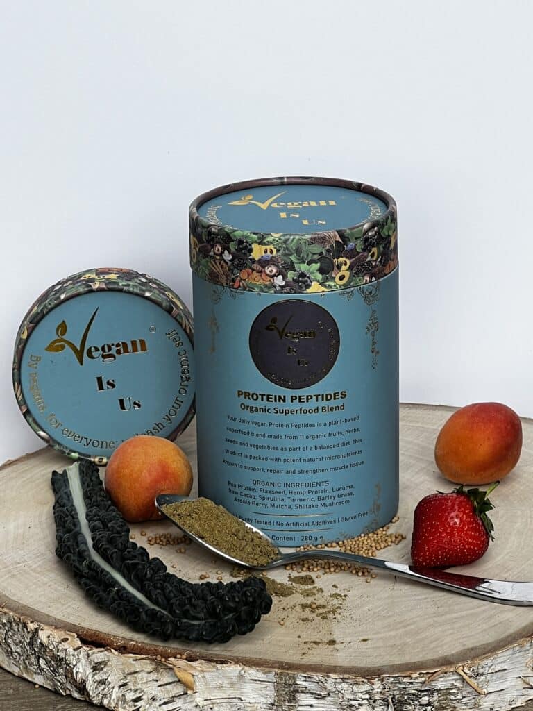 Image of Protein Peptides | Organic Superfood Blend tub surrounded by fruits