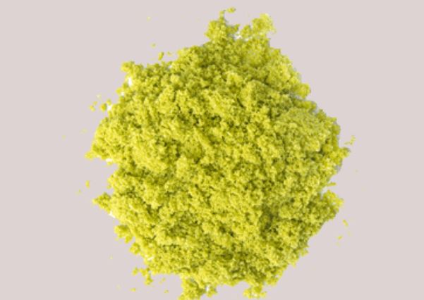 Close-up of vibrant green avocado powder highlighting its natural, nutrient-rich properties.